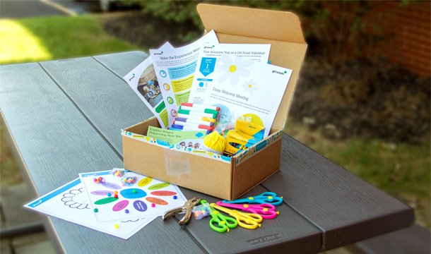 Box full of Girl Scout Daisy supplies